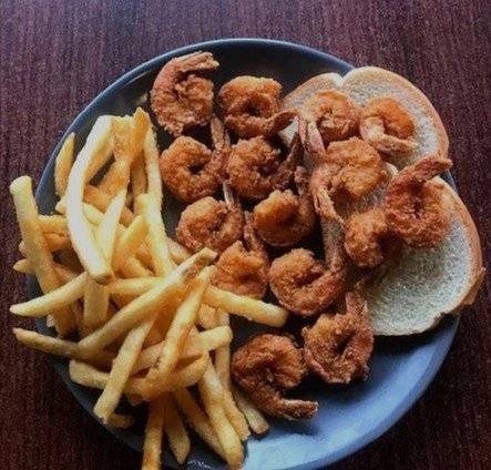 Picture of a dish contained of shrimp, fries, and toast from Chicago Fish and Chicken Girll
